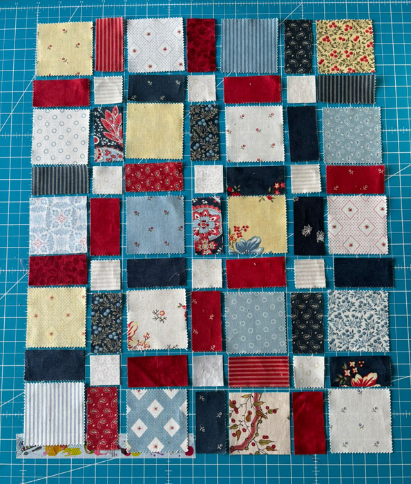 Miniquilt aus Quadraten und Rechtecken